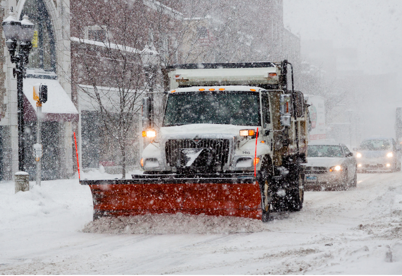 Snow plow in a storm